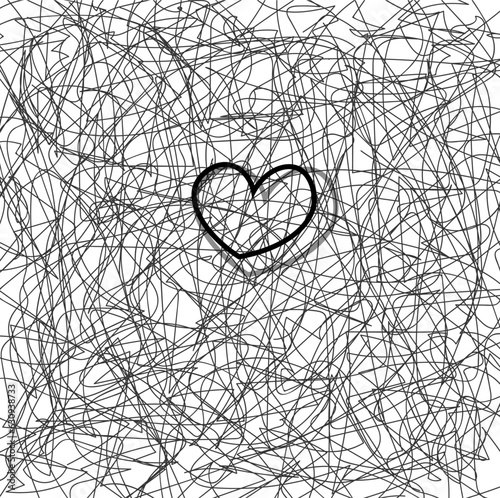 On top of the web or tangled wires there is a contour heart