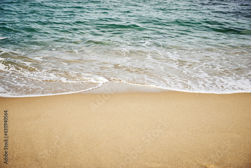 Gentle waves on a sandy beach