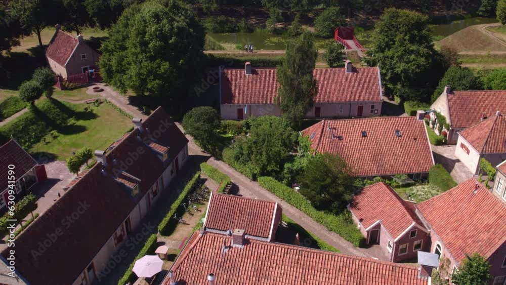 custom made wallpaper toronto digitalDrone view of small houses at Fortress Bourtange Holland during bright summer day, aerial