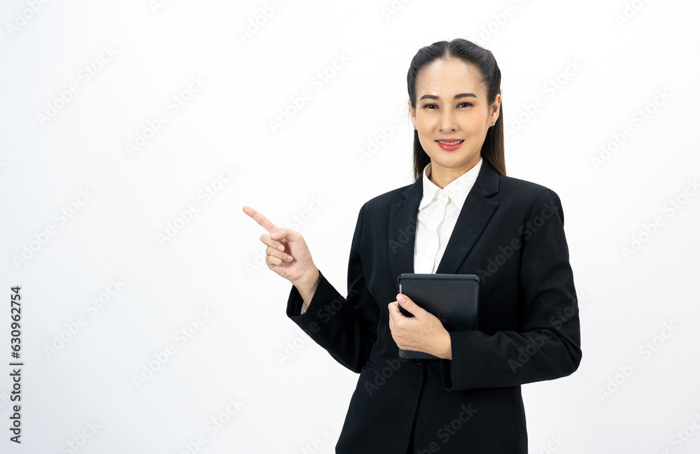 Portrait beautiful Businesswoman in suit with tablet standing on isolated background. Confident woman using tablet. Executive Smart businessman Portrait beautiful Businesswoman in suit with tablet standing on isolated background. Confident woman using tablet. Executive Smart businessman