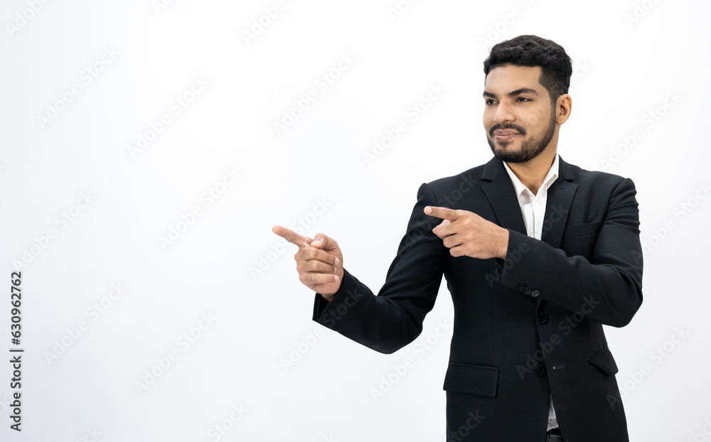 Pointing finger to blank space. Happy Young asian businessman on isolated white background. Handsome businessman in office suit uniform. Pointing finger to blank space. Happy Young asian businessman on isolated white background. Handsome businessman in office suit uniform.
