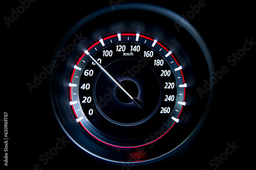 80 Kilometers per hour,light with car mileage with black background,number of speed,Odometer of car.