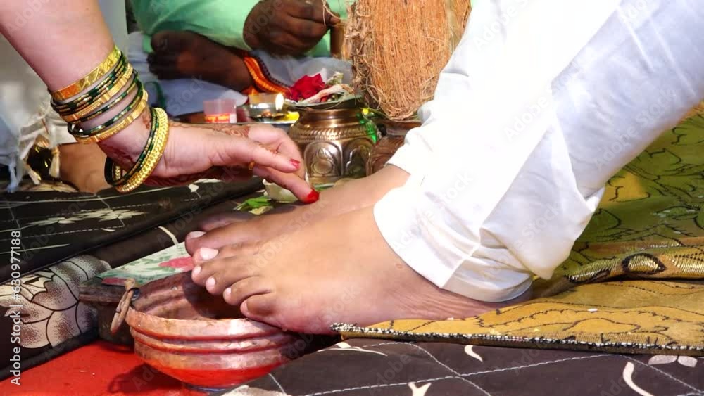 Applying Hindu Swastik on a groom egs in marriage ritual. Marathi Wedding Ceremony. Indian Marriage. Swastik As Symbol Of Sun. Hindu Religion Symbol	