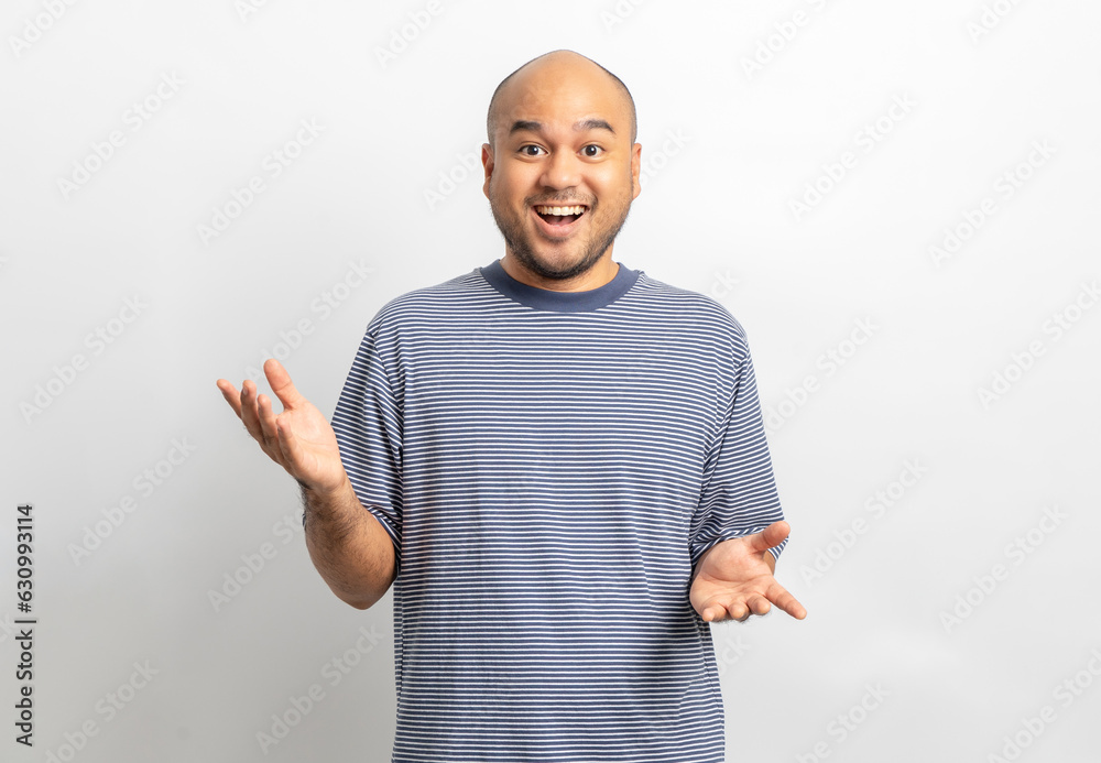 Handsome young man smiling and happy. Charming male standing with on isolated white background. Asian people pose with white backdrop. Handsome young man smiling and happy. Charming male standing with on isolated white background. Asian people pose with white backdrop.