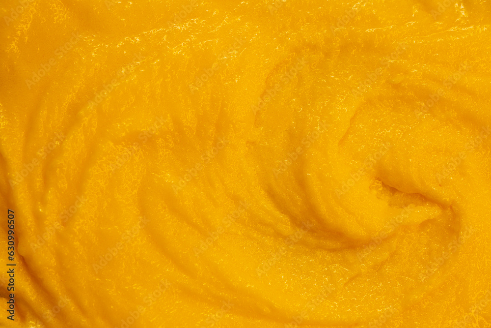 Fruit yogurt ice cream. Smoothies from fresh fruits and berries. Ice cream texture. Delicious sweet dessert close-up as a background. Fruit yogurt ice cream. Smoothies from fresh fruits and berries. Ice cream texture. Delicious sweet dessert close-up as a background.