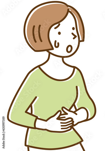 痛くてお腹を押さえる若い女性