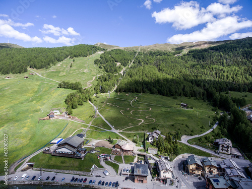 Livigno village ski and Bikepark valley in Valtellina, Lombardia, Italy Aerial view Drone panoramic view photo