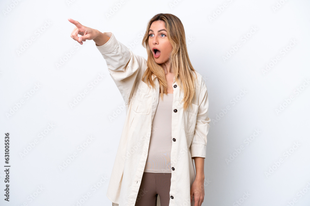 Young Uruguayan woman isolated on white background pointing away Young Uruguayan woman isolated on white background pointing away
