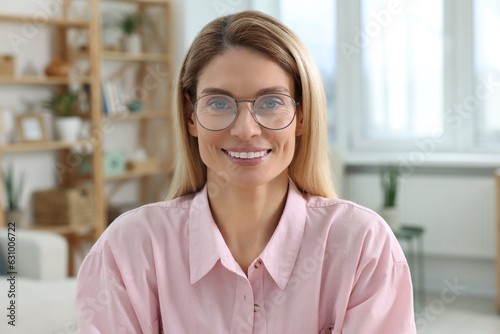 Happy woman having video call at home, view from web camera