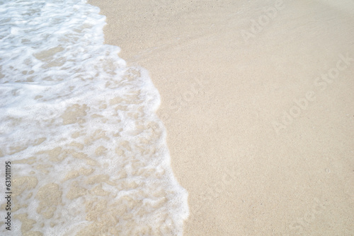 Foam wave on sand beach, summer holiday concept