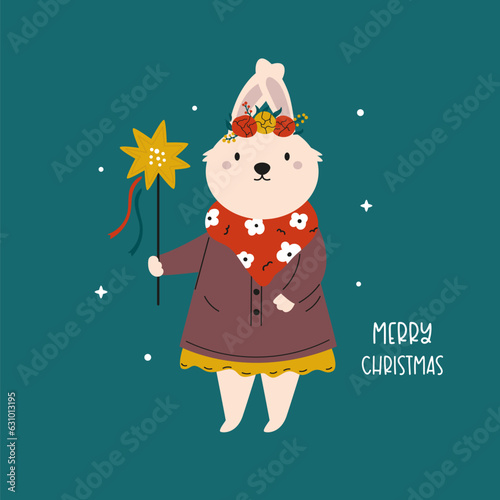 Holiday Christmas card with cute bunny rabbit in tradititional Ukraininan costume and star in the hand. Colorful print with animal character, vertep personage photo