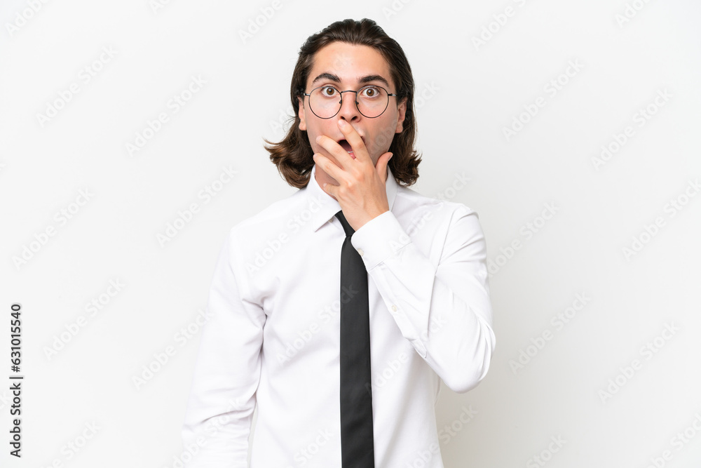 Business handsome man isolated on white background surprised and shocked while looking right Business handsome man isolated on white background surprised and shocked while looking right