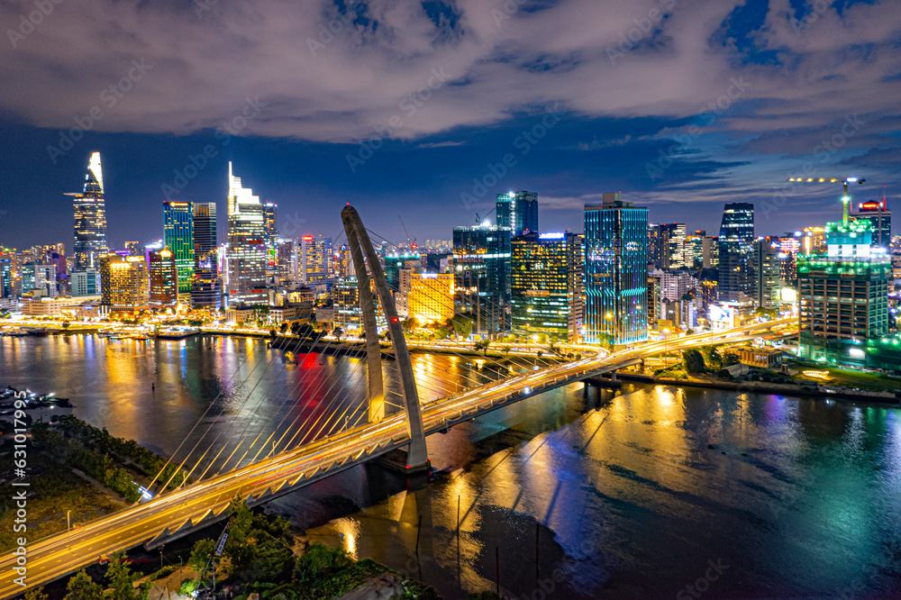 Obraz premium Sunset on Saigon riverside, Ho Chi Minh city Vietnam. Photo taken on 15th July, 2023.