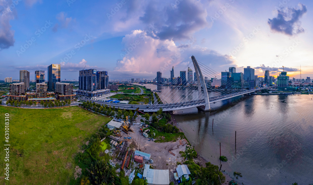 Naklejka premium Sunset on Saigon riverside, Ho Chi Minh city Vietnam. Photo taken on 15th July, 2023.