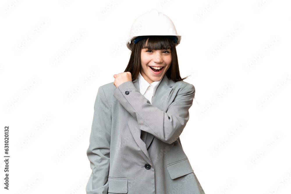 Little girl playing as a architect with helmet and holding blueprints over isolated background celebrating a victory Little girl playing as a architect with helmet and holding blueprints over isolated background celebrating a victory