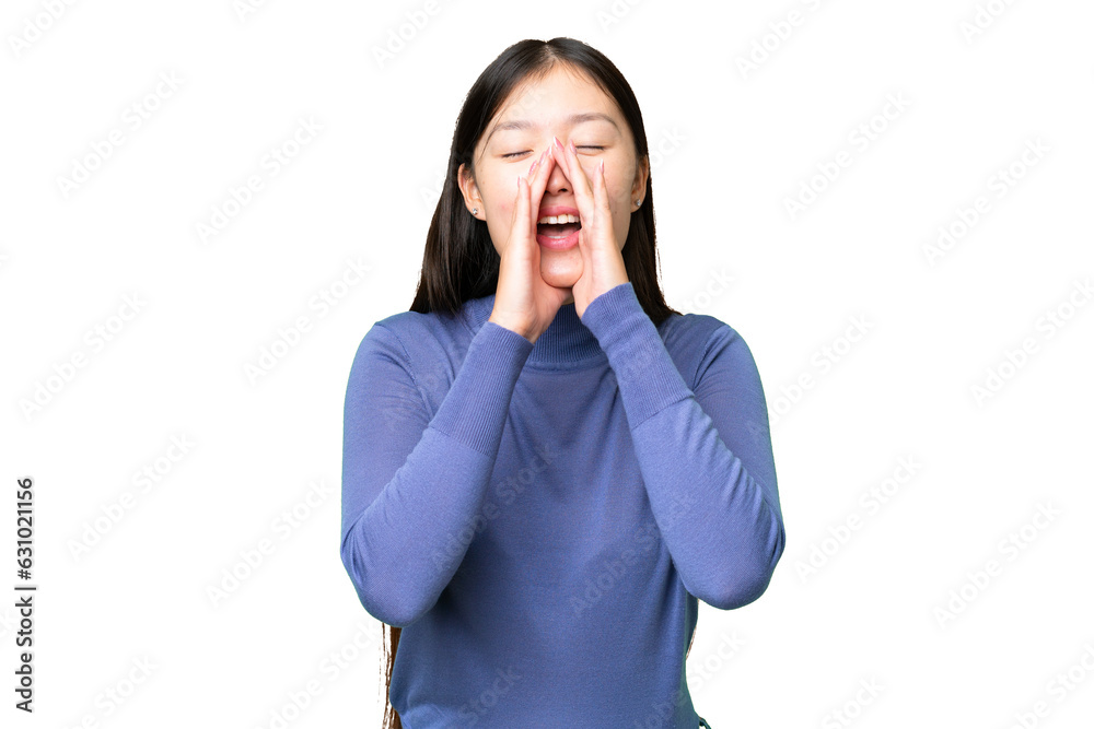 Young Asian woman over isolated chroma key background shouting and announcing something Young Asian woman over isolated chroma key background shouting and announcing something