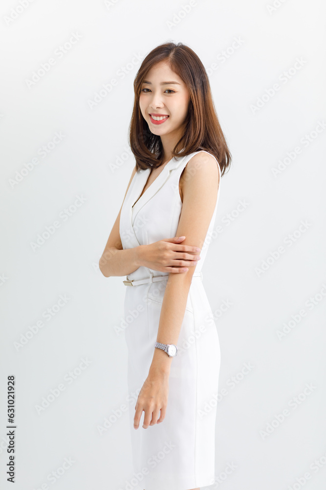 Isolated cut-out studio portrait of beautiful asian professional successful businesswoman in casual business attire posing comfortably. on a white background Isolated cut-out studio portrait of beautiful asian professional successful businesswoman in casual business attire posing comfortably. on a white background