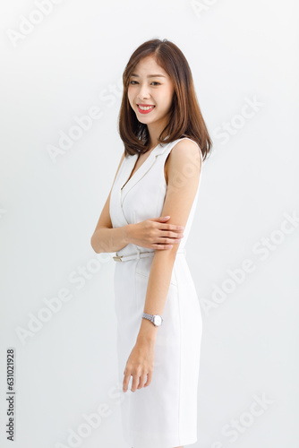 Isolated cut-out studio portrait of beautiful asian professional successful businesswoman in casual business attire posing comfortably. on a white background