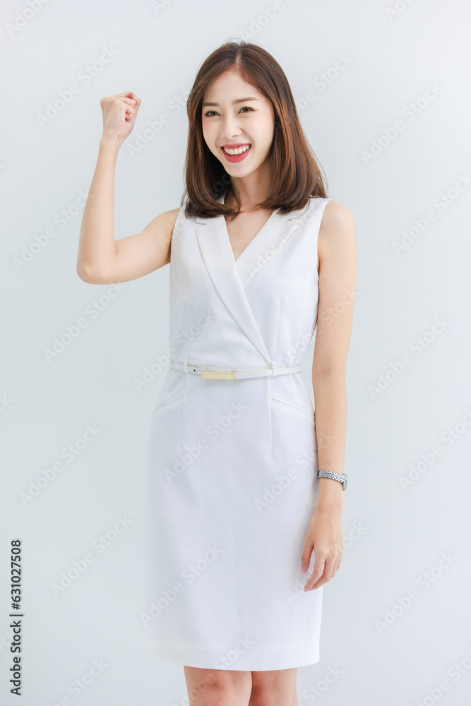 Isolated cut-out studio portrait of beautiful asian professional successful businesswoman in casual business attire posing comfortably. on a white background Isolated cut-out studio portrait of beautiful asian professional successful businesswoman in casual business attire posing comfortably. on a white background