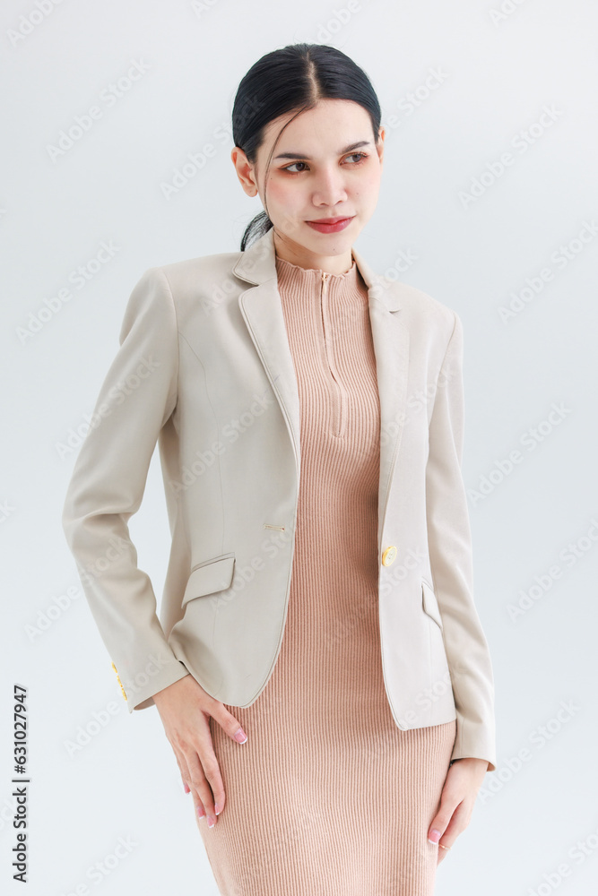Portrait isolated cutout studio shot of Asian beautiful professional successful female businesswoman ceo entrepreneur in casual business wear standing smiling posing crossed arms on white background Portrait isolated cutout studio shot of Asian beautiful professional successful female businesswoman ceo entrepreneur in casual business wear standing smiling posing crossed arms on white background