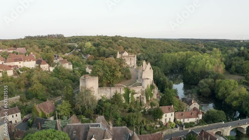 Labelled one of Les Plus Beaux Villages de France (Most beautiful Villages of France), an aerial point of view of the village of Angles sur l’Anglin with the ruined castle overlooking the Anglin river photo