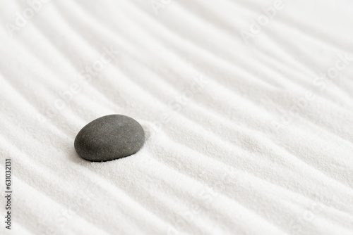 Zen Garden with Pebble Stone on White Sand Line Texture Background, Top View Black Rock Sea Stone on Sand Wave Lines Pattern in Japanese stye, Simplicity Day, Meditation,Zen like concept.