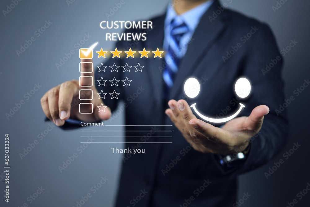 Businessman evaluate his satisfaction with product quality and service with five star rating and a smile that very satisfied and more likely to use the service next time and may recommend others too. Businessman evaluate his satisfaction with product quality and service with five star rating and a smile that very satisfied and more likely to use the service next time and may recommend others too.