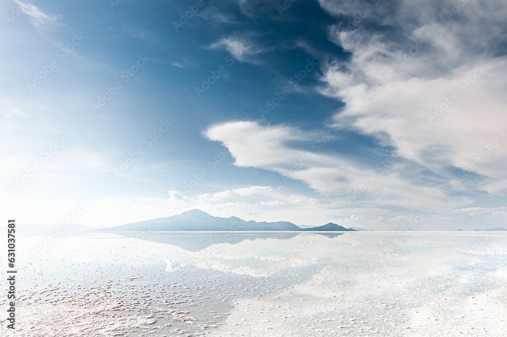 Salt surface with water in Salar de Uyuni salt flat in Bolivia.