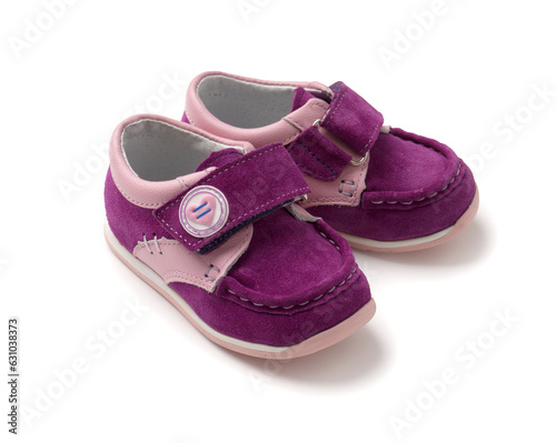 Violet pink new shoes for girls. Casual girlish suede shoes for toddlers on a white background.