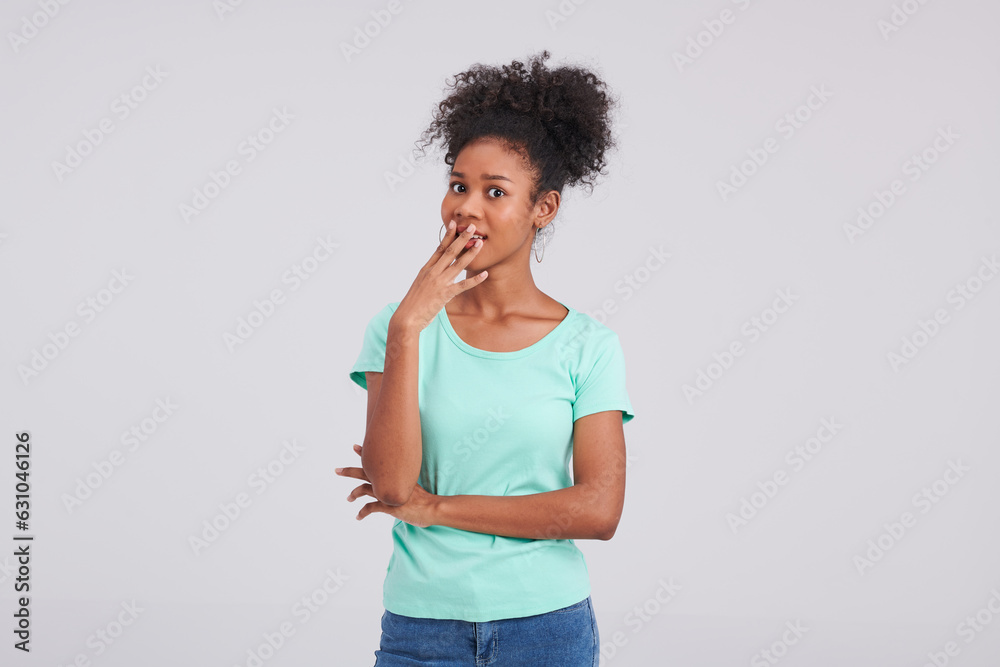 Exuding chic style, a woman strikes a pose in mint shirt and blue jeans, showcasing her unique fashion sense during the studio shoot. Exuding chic style, a woman strikes a pose in mint shirt and blue jeans, showcasing her unique fashion sense during the studio shoot.