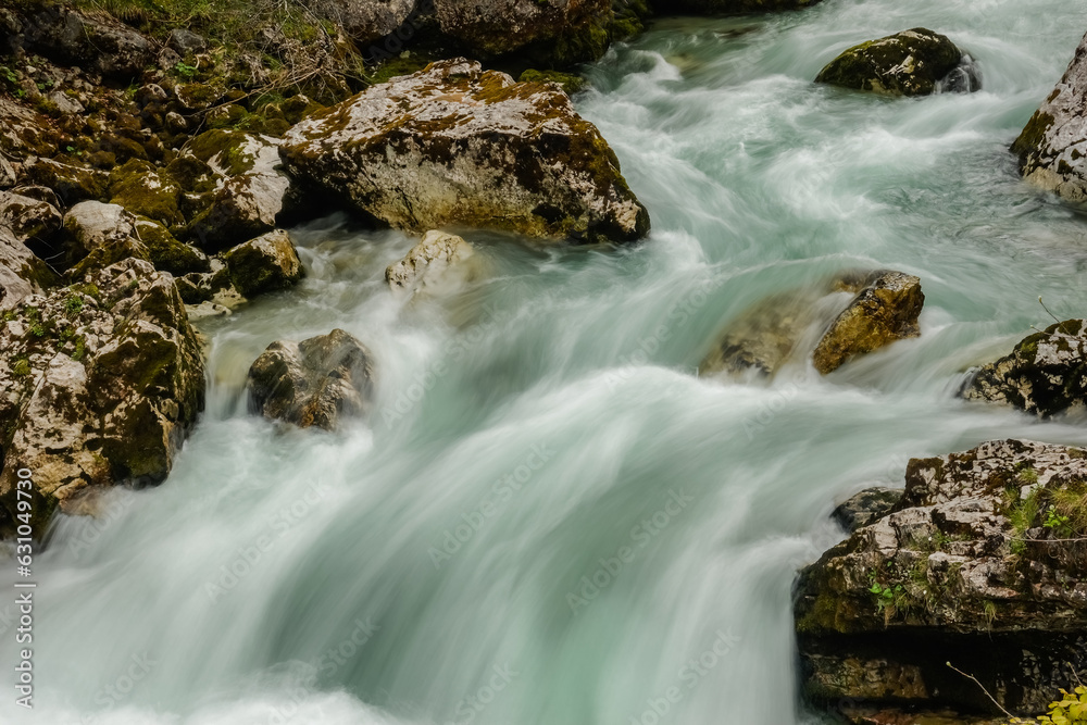fast flowing wate from a torrent during hiking in spring fast flowing wate from a torrent during hiking in spring