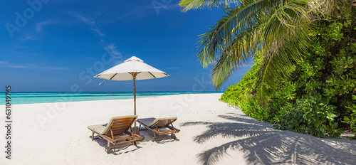 Love couple amazing beach. Sunny umbrella and lounge chairs beds close to sea under palm leaves. Summer relax coast landscape, leisure inspire honeymoon vacation, romantic lifestyle. Freedom travel