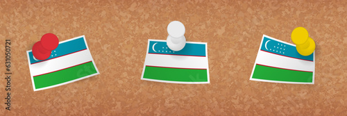 Uzbekistan flag pinned in cork board, three versions of Uzbekistan flag.