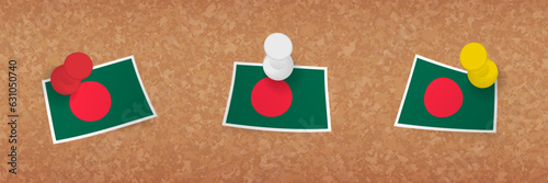 Bangladesh flag pinned in cork board, three versions of Bangladesh flag.