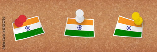 India flag pinned in cork board, three versions of India flag.