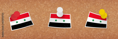 Syria flag pinned in cork board, three versions of Syria flag.
