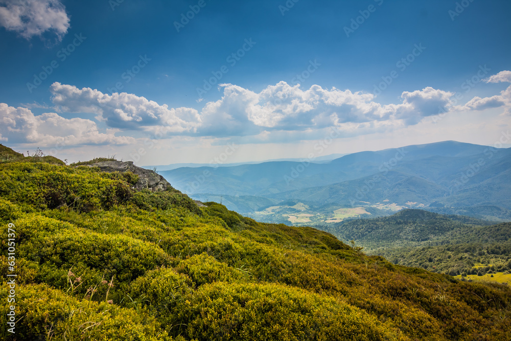 Beautiful view of the Ukrainian mountains Carpathians and valleys.Beautiful green mountains in summer with forests and grass. Water-making ridge in the Carpathians, Carpathian mountains
