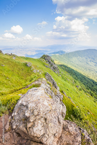 Beautiful view of the Ukrainian mountains Carpathians and valleys.Beautiful green mountains in summer with forests, rocks and grass. Water-making ridge in the Carpathians, Carpathian mountains