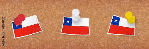 Chile flag pinned in cork board, three versions of Chile flag.