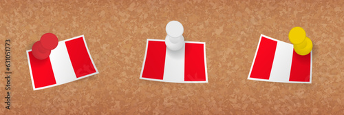 Peru flag pinned in cork board, three versions of Peru flag.