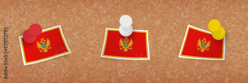 Montenegro flag pinned in cork board, three versions of Montenegro flag.