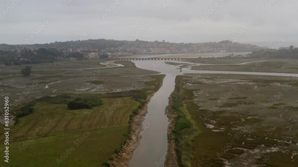 Panoramic open landscape aerial across marsh. San Vicente de la Barquera, Spain Panoramic open landscape aerial across marsh. San Vicente de la Barquera, Spain