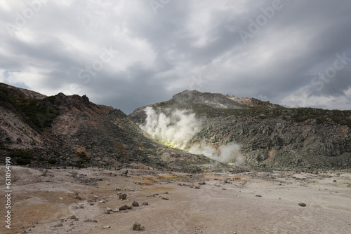 Sulphur pieces on Iozan (sulfur mountain) active volcano area, Akan National Park, Hokkaido, Japan photo