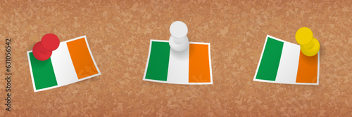 Ireland flag pinned in cork board, three versions of Ireland flag.