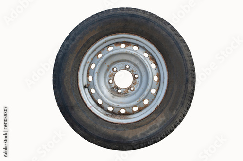 Old wheel rim and tire of car on white background