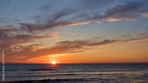The sun is on the horizon. Beautiful seascape. Baltic Sea. Positive photography. © Igor