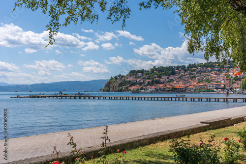 Walkway along the lake in Ohrid North Macedonia during the Summer with clouds and a blue sky