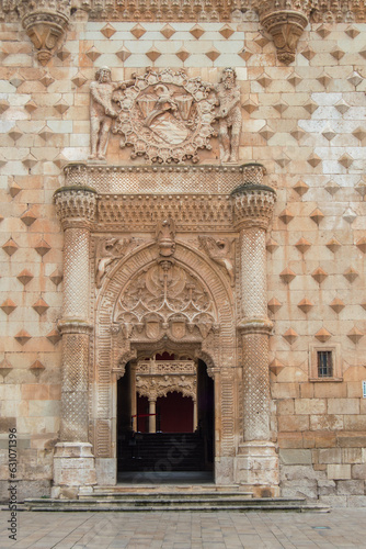 Entrance and carved façade of the palace of the Dukes of Infantado in Guadalajara. Spain photo