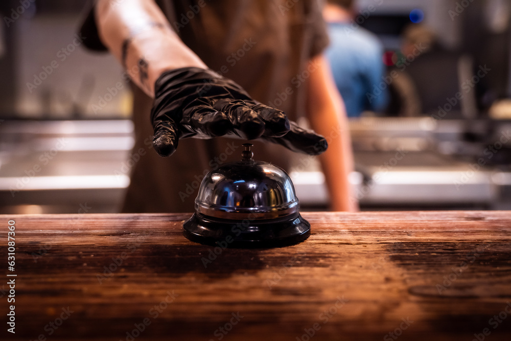 Cameriere che sta per suonare la campana Stock Photo Adobe Stock