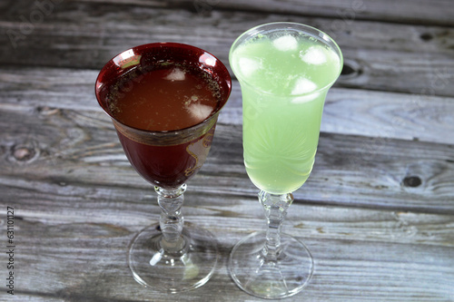 Lemon mint soft drink with ice, green pop soda, carbonated lemonade drinks, often contain very high levels of sodium benzoate, and this often imparts a slight metallic taste to the beverage photo